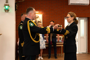 Uroczystość pożegnania ze służbą kmdr ppor. SG. Joanny Sumińskiej. Fot. Piotr Kurasz Uroczystość pożegnania ze służbą kmdr ppor. SG. Joanny Sumińskiej. Fot. Piotr Kurasz