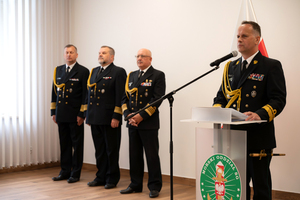 Uroczystość pożegnania ze służbą kmdr ppor. SG. Joanny Sumińskiej. Fot. Piotr Kurasz Uroczystość pożegnania ze służbą kmdr ppor. SG. Joanny Sumińskiej. Fot. Piotr Kurasz